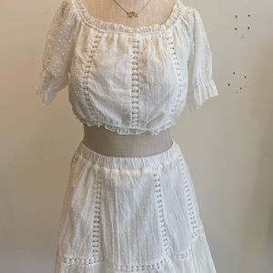 2 piece, crop top short sleeve and skirt.